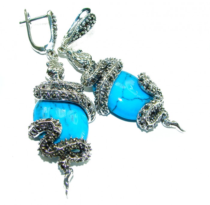 Great authentic inlay Turquoise .925 Sterling Silver handcrafted Earrings - Turquoise and silver snake earrings close-up, front view.