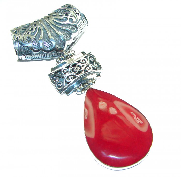 Bright Energy Authentic Coral .925 Sterling Silver Bali handmade pendant - Close-up of coral pendant with intricate sterling silver Bali design.
