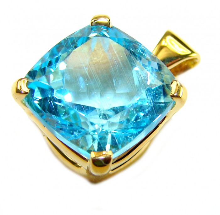 Atlantica cushion cut 10.9 carat Swiss Blue Topaz 18K Gold over .925 Sterling Silver Handcrafted Pendant - Close-up of a cushion cut Swiss Blue Topaz in 18K gold setting