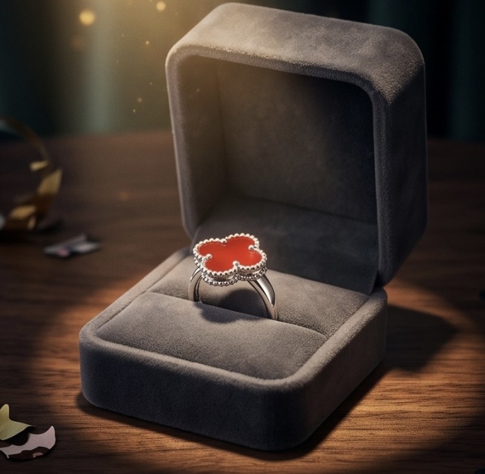 A four-leaf clover Coral .925 Sterling Silver handcrafted ring s. 6 1/4 - Four-leaf clover coral ring in open box, front angle view.