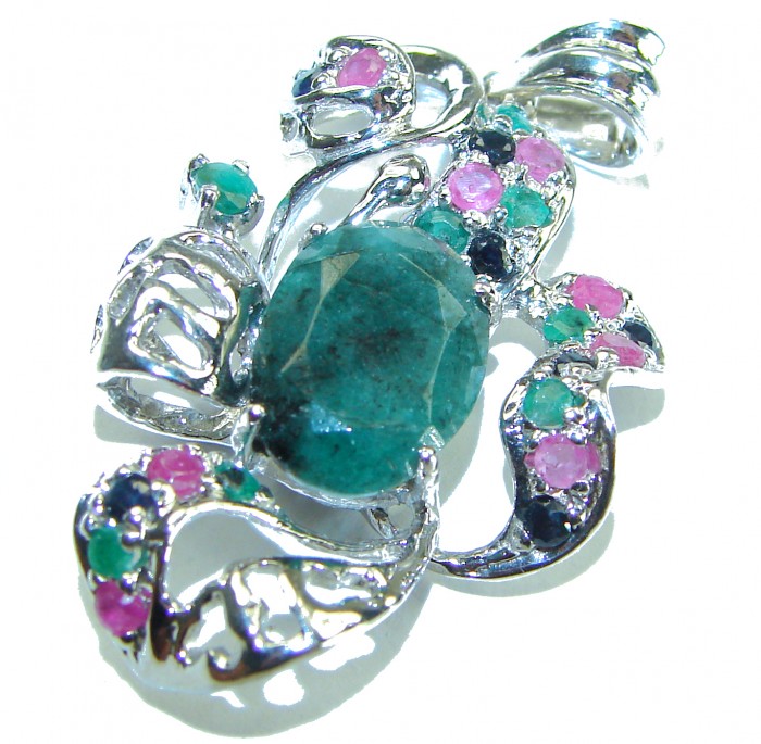 Perfect quality authentic 11.2 Grandidierite .925 Sterling Silver handmade Pendant - Sterling silver pendant with Grandidierite and gemstones, angled view.
