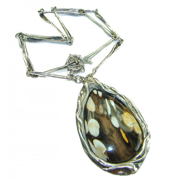 Genuine Petrified Palm Wood .925 Sterling Silver handcrafted necklace - Sterling silver necklace with petrified palm wood pendant, top view.