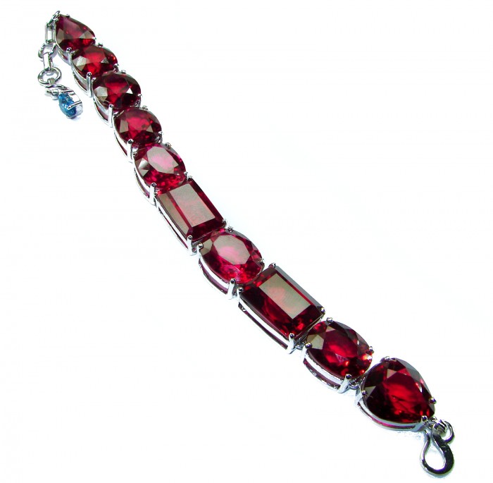 Passion - Magnificent 247.4 carat Red Ruby .925 Sterling Silver handcrafted Heavy Bracelet - Red ruby bracelet angled view, 247.4 carats, sterling silver.
