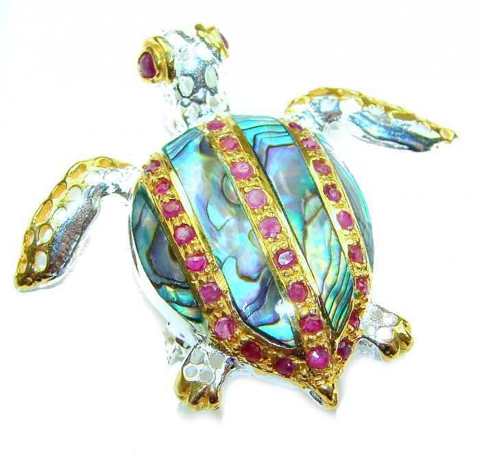 Good health and Long life Turtle Genuine Rainbow Abalone 14K Gold over .925 Sterling Silver handcrafted Pendant brooch - Turtle-shaped pendant with rainbow abalone and ruby details, top view.