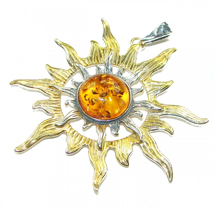 Bright Sun Baltic Polish Amber 14k Gold over .925 Sterling Silver handcrafted Pendant - Sun-shaped amber pendant in gold and silver, top view.
