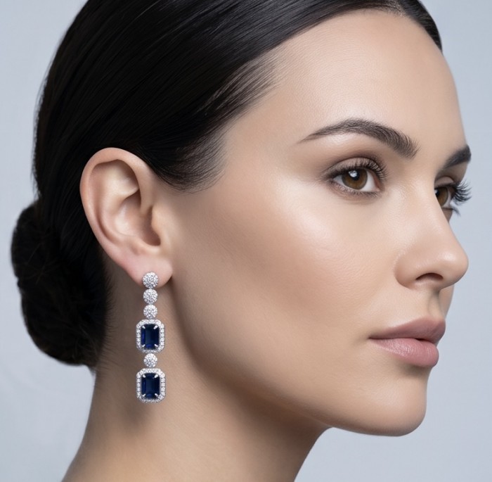Ofelia - Authentic 8.7 CARAT natural Sapphire .925 Sterling Silver handcrafted .925 Sterling Silver handmade Statement earrings - Side view of woman wearing sapphire and diamond drop earrings.