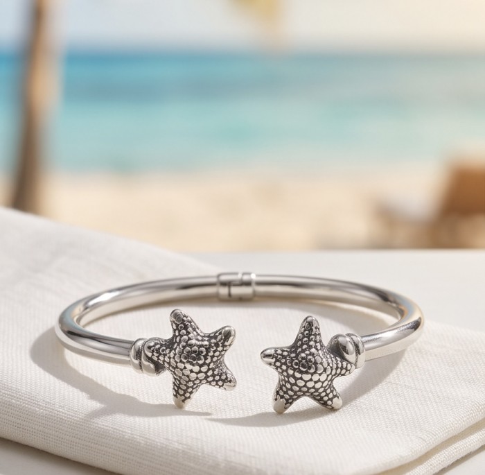 Seaside Italy made Starfish Bracelet in best quality .925 Sterling Silver - Starfish bracelet on cloth, beach in background, front angle view