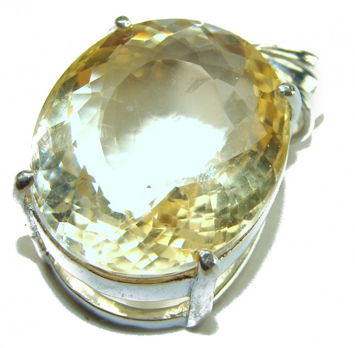 Perfection Oval cut 23.3 carat Lemon Quartz .925 Sterling Silver handcrafted pendant - Close-up of oval cut 23.3 carat lemon quartz in .925 sterling silver setting.