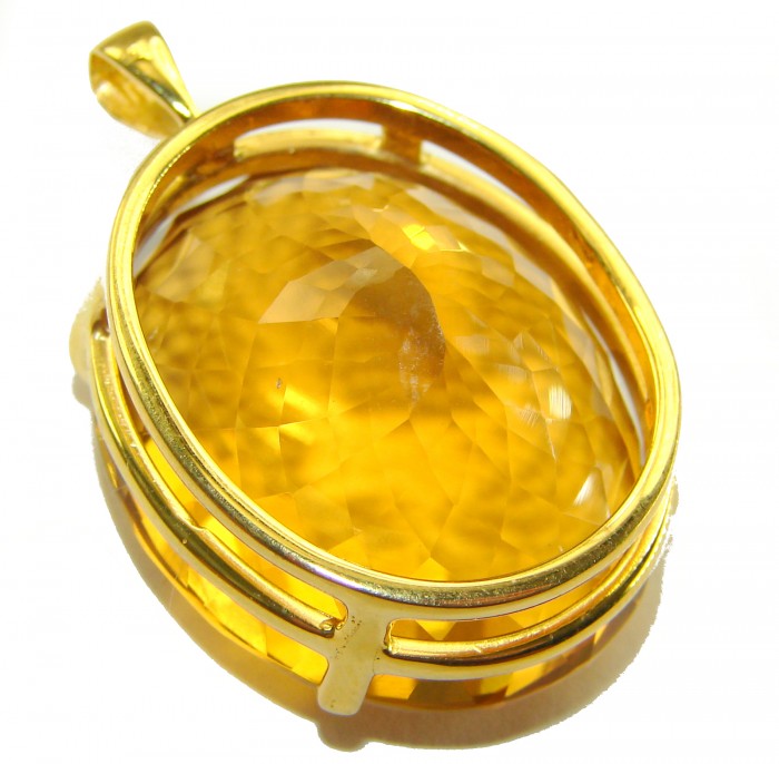 Luxury genuine 47.7CARAT oval cut Champagne Topaz .925 Sterling Silver dipped in 22K Gold handmade Pendant - Close-up of Champagne Topaz pendant with gold setting, oval cut, 47.7 carats.