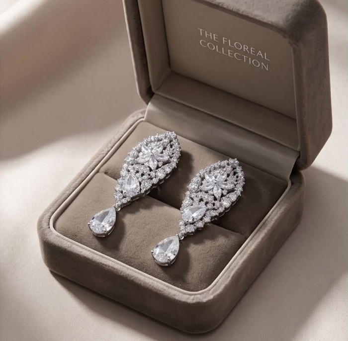 Veronica - Precious 35.5 carta White Topaz rhodium over .925 Sterling Silver .925 Sterling Silver Statement earrings - Elegant earrings in box, top view, showcasing white topaz and rhodium.