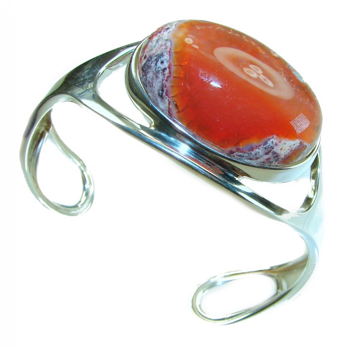 Simplicity 85.5 carat Genuine Mexican Fire Opal handcrafted .925 Sterling Silver Bracelet / Cuff - Side view of silver cuff with large Mexican Fire Opal stone.