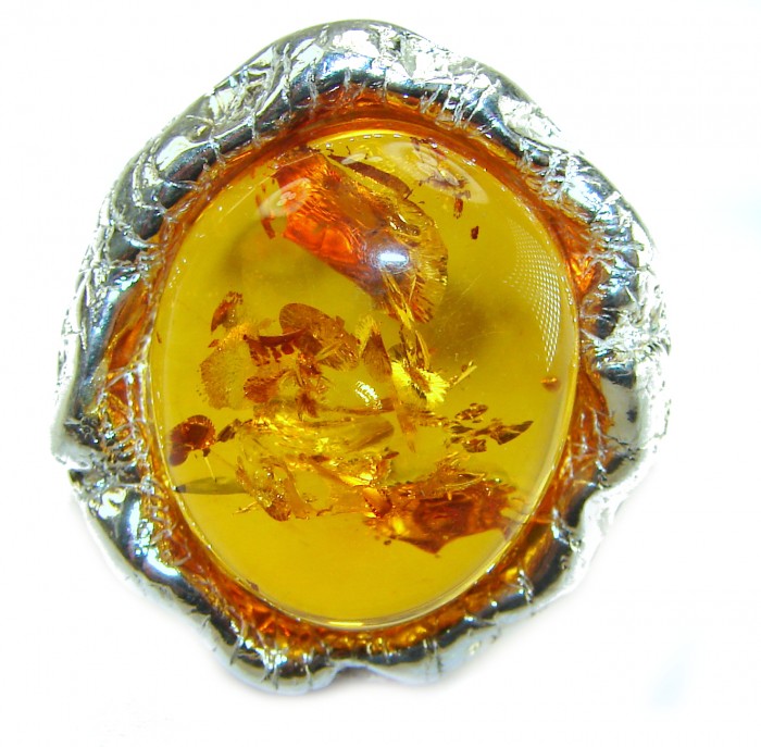 Large Golden Power natural Baltic Amber .925 Sterling Silver handcrafted ring; s. 7 adjustable - Close-up of Baltic Amber gemstone in silver setting.