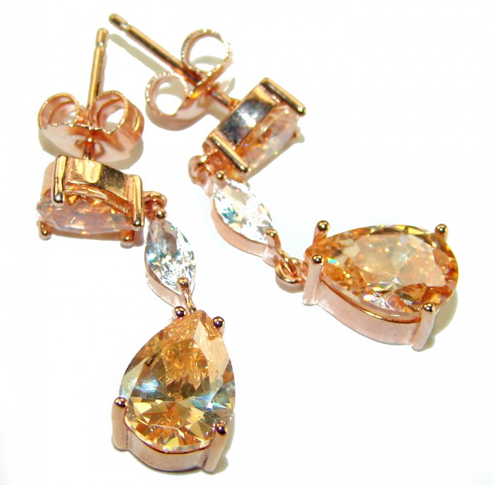 Luxurious Oval cut 7.5 carat Yellow Sapphire 18K Gold over .925 Sterling Silver handcrafted earrings - Yellow sapphire earrings, 18K gold, top view, showing stones and settings.