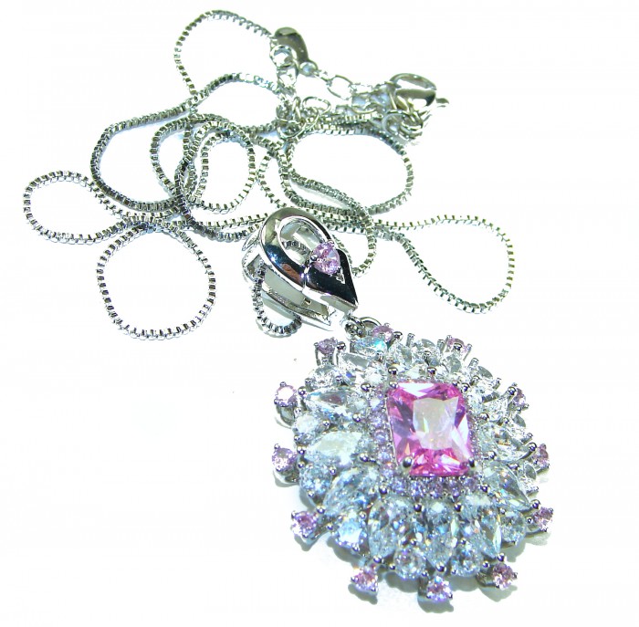 SPECTACULAR- Outstanding quality - 27.5 carat Pink Topaz .925 Sterling Silver handcrafted Statement necklace - Close-up of pink topaz pendant with silver chain detailing.