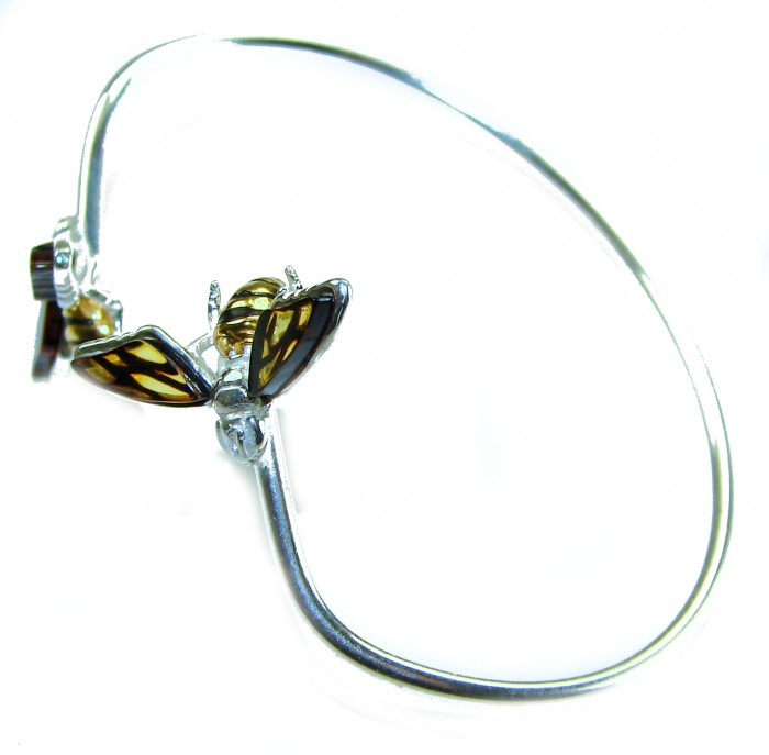 Golden Bees Genuine Baltic Amber .925 Sterling Silver handamde Bracelet - Sterling silver bracelet with amber bee detail, side view.