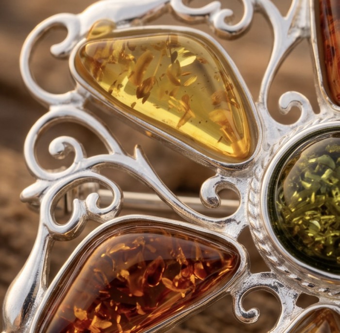 Golden Harmony Authentic Baltic Amber rhodium over .925 Sterling Silver handcrafted pendant - Close-up of Baltic amber stones in ornate silver setting