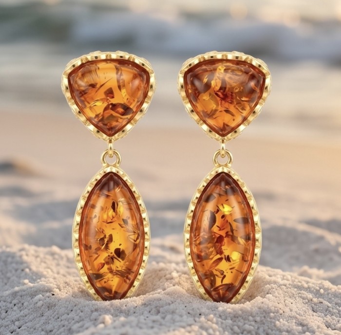 Golden authentic Baltic Amber 14K Gold over .925 Sterling Silver earrings - Amber earrings on sand with gold details, front view