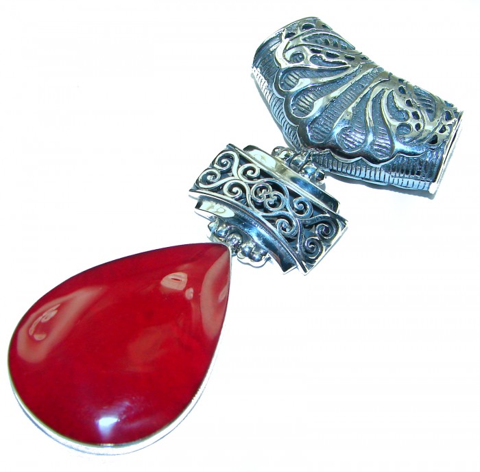 Bright Energy Authentic Coral .925 Sterling Silver Bali handmade pendant - Coral and sterling silver pendant, top view detailing filigree design.