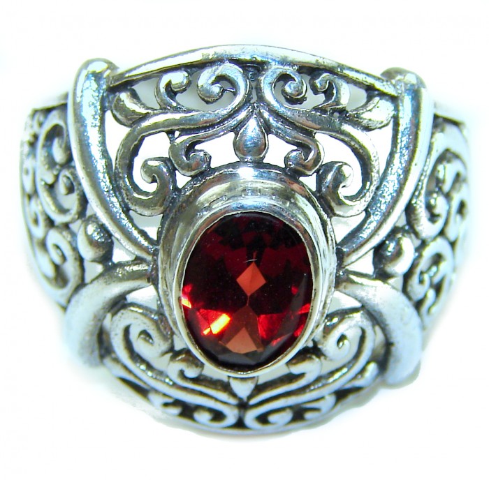 4.5 carat oval cut Red Garnet .925 Sterling Silver handcrafted ring; s. 7 1/4 - Close-up of red garnet stone set in ornate sterling silver ring