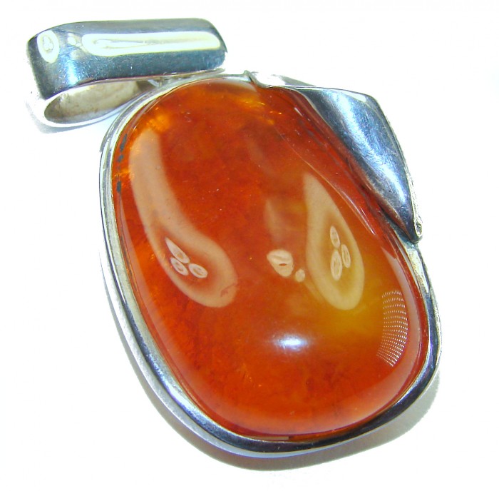 Prehistoric Authentic Baltic Amber .925 Sterling Silver beautifully handcrafted Pendant - Close-up of prehistoric Baltic amber in sterling silver setting pendant.