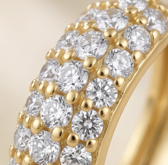 Dubai Style - 0.8 carat pave White Topaz .925 Sterling Silver dipped in 18K Gold handmade Earrings - Close-up of gold-toned ring with pave white topaz stones