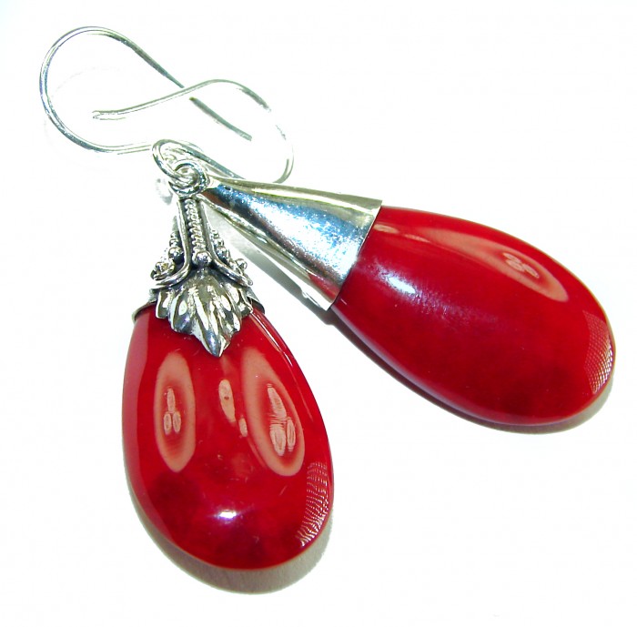 Large Genuine Red Fossilized Coral .925 Sterling Silver handmade earrings - Close-up of large red fossilized coral in sterling silver earring.