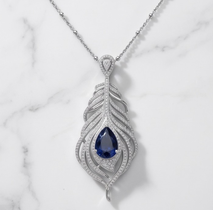 Precious Magic Feather 10.2 carat Sapphire .925 Sterling Silver .925 Sterling Silver Statement Necklace - Front view of Precious Magic Feather sapphire necklace on marble background