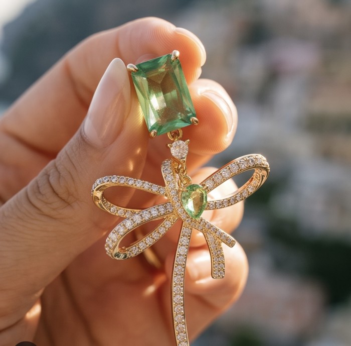 Luxurious 7.9 carat authentic Himalayan Peridot .925 Sterling Silver dipped in 14K Gold Handcrafted Statement Earrings - Luxurious Himalayan Peridot earring close-up in hand