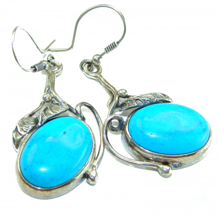 Great authentic Sleeping Beauty Turquoise .925 Sterling Silver handcrafted Earrings - Turquoise earrings close-up with silver detailing