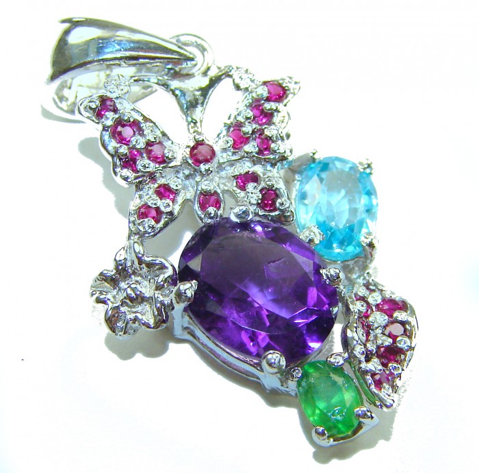 Mademoiselle - 12.5 carat natural Amethyst .925 Sterling Silver handcrafted Pendant - Close-up of colorful gemstone pendant with butterfly design.