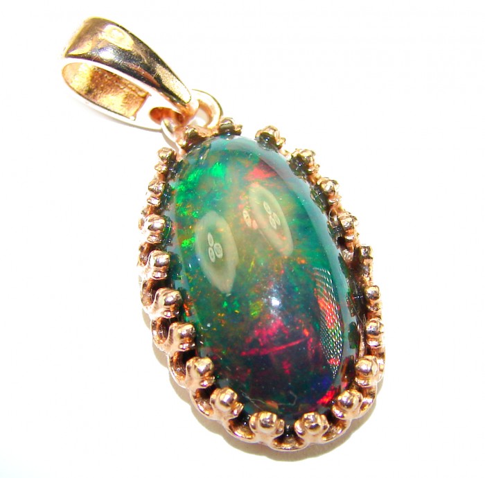 Black Galaxy 14.5 ctw Authentic Black Opal 18K Gold over .925 Sterling Silver handmade Pendant - Close-up of Black Galaxy Opal pendant in 18K gold setting.