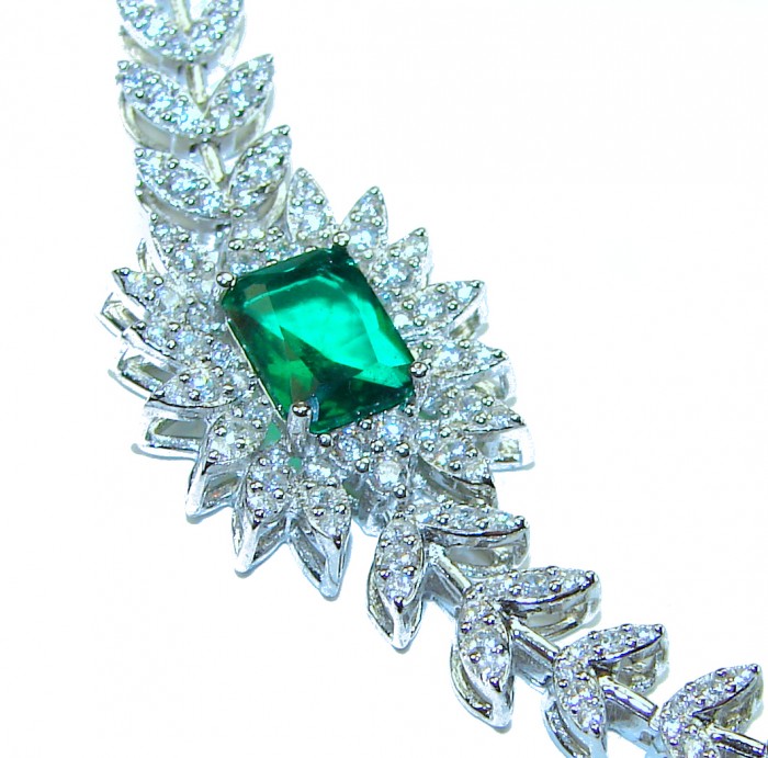 Giovanna - Authentic 15.9 carat Emerlad .925 Sterling Silver handcrafted Statement bracelet - Close-up of emerald and diamond-studded silver bracelet.