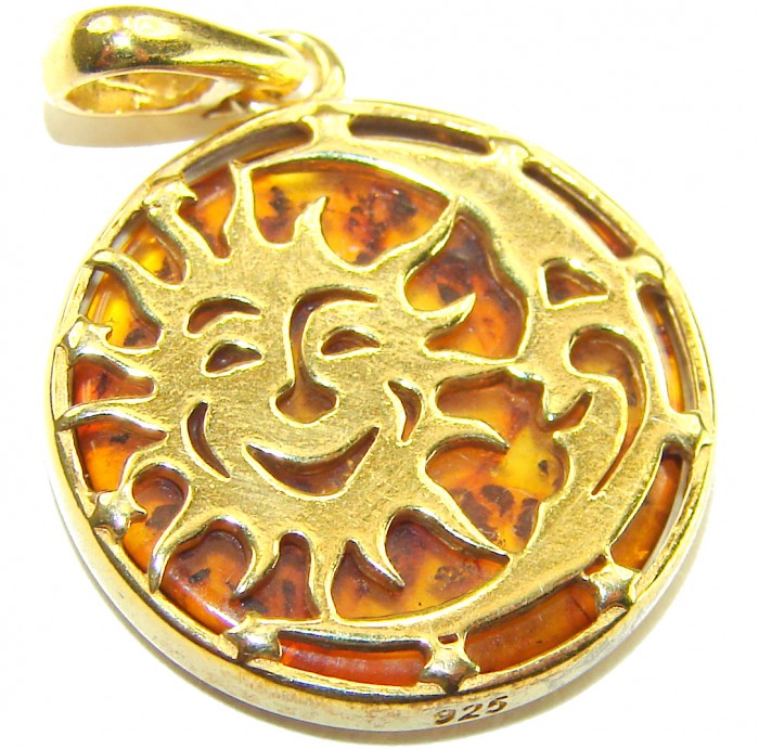 Perfect Balance Prehistoric Authentic Baltic Amber .925 Sterling Silver beautifully handcrafted Pendant - Amber sun pendant close-up, gold-tone with .925 sterling silver.