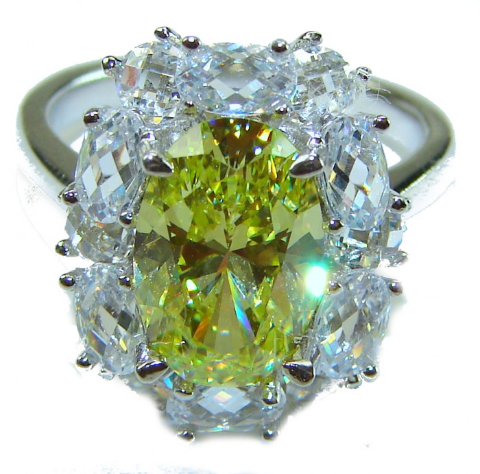 Splendid princess cut 10.2 carat yellow Sapphire .925 Sterling Silver brilliantly handcrafted ring s. 7 1/4 - Close-up of yellow sapphire ring with surrounding clear stones.