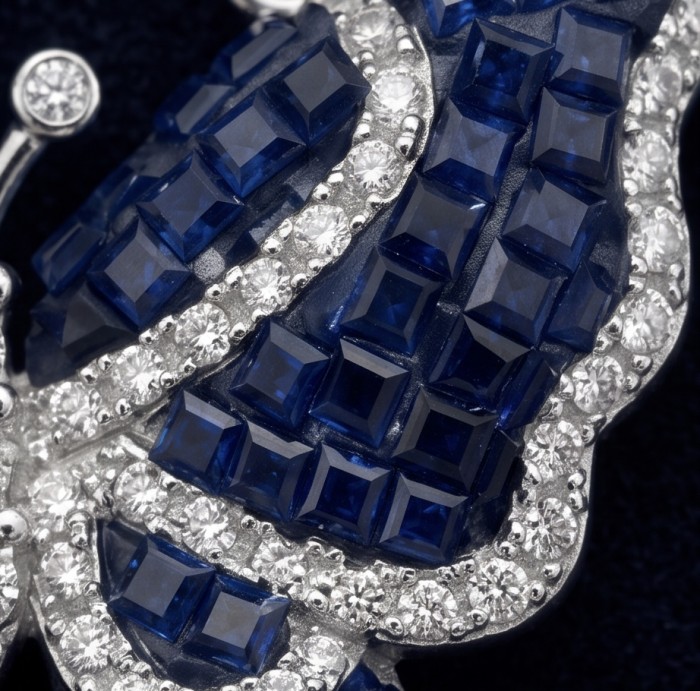 Precious Blue Butterfly mystery setting 14.2 carat natural Sapphire .925 Sterling Silver Necklace - Close-up of blue square stones and diamonds on butterfly jewelry.