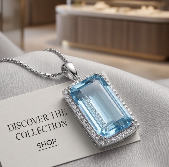 Angelina 10.9 carat authentic Aquamarine .925 Sterling Silver Handcrafted pendant - Close-up of Angelina Aquamarine pendant on silver chain with card background