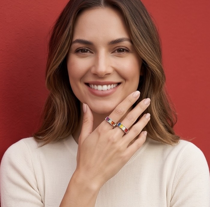 My own Rainbow - authentic 8.7 carat Topaz .925 Sterling Silver Ring size 7 - Woman wearing My own Rainbow rings on hand against red background
