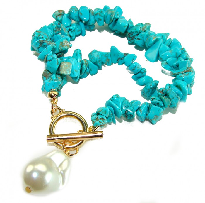Luxurious natural Turquoise 14K Gold over .925 Sterling Silver handmade necklace - Turquoise bracelet with gold clasp and pearl detail, close-up view
