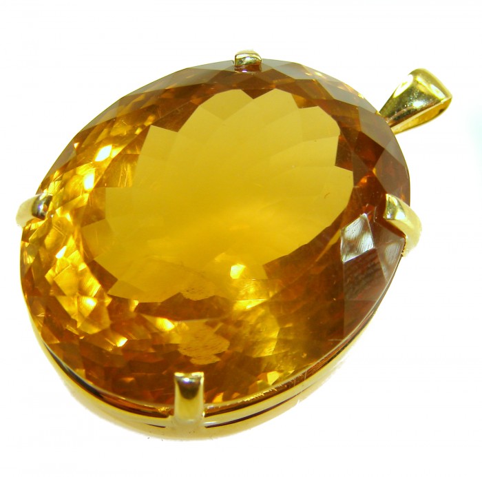 Luxury genuine 47.7CARAT oval cut Champagne Topaz .925 Sterling Silver dipped in 22K Gold handmade Pendant - Close-up of 47.7-carat oval champagne topaz pendant in gold setting