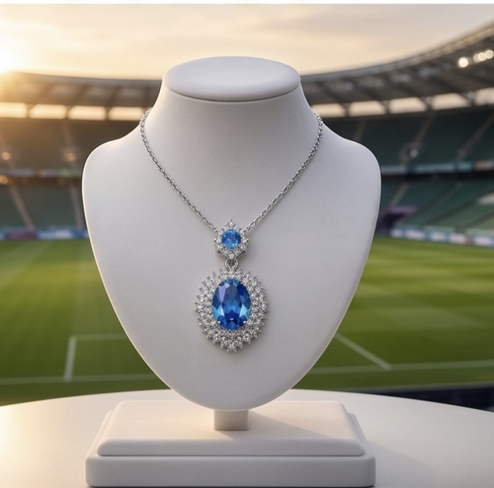 Blue Drop - 8.5 carat authentic Swiss Blue Topaz .925 Sterling Silver handcrafted necklace - Front view of Blue Drop necklace with Swiss Blue Topaz on display stand.