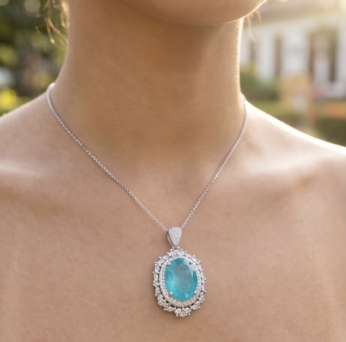 Wonderland 12.8 carat classic oval cut Paraiba Tourmaline Moissanite .925 Sterling Silver Handcrafted Statement necklace - Necklace with 12.8 carat Paraiba Tourmaline, front view worn on neck