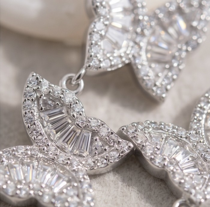 Four Butterflies natural 7.5 carat White Topaz .925 Sterling Silver handmade Statement necklace - Close-up of white topaz butterfly earrings in .925 sterling silver.