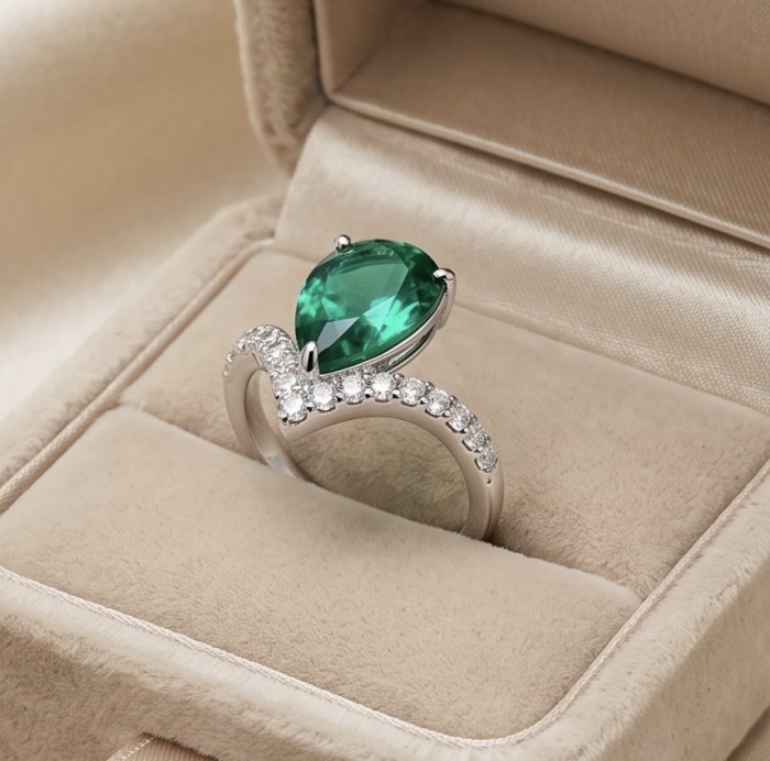 Precious Green Drop 12.2 CARAT Chrome Diopside .925 Sterling Silver Statement Ring s. 7 - Side view of ring with green drop stone and diamond accents.