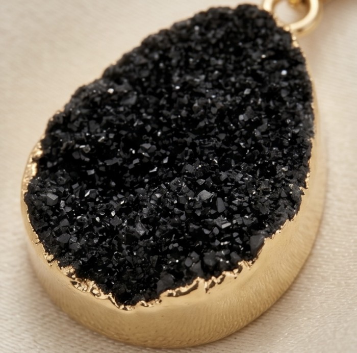 Boho Style Genuine Black Druzy .925 Sterling Silver handmade necklace - Close-up of black druzy stone pendant with gold setting.