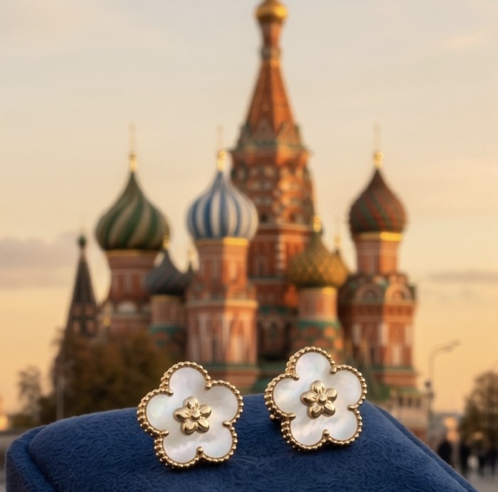Genuine Blister Pearl .925 Sterling Silver handcrafted Statement Earrings - Close-up of floral pearl earrings with cathedral backdrop.