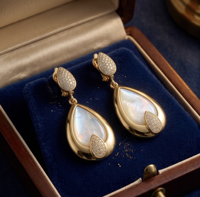 Top quality Sublime Blister Pearl 22K Gold over .925 Sterling Silver handcrafted Earrings - Elegant pearl and gold earrings in a display box, top view.
