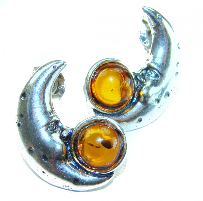 Magic MOON Baltic Polish Amber .925 Sterling Silver Earrings - Moon-shaped amber earrings, close-up front view.