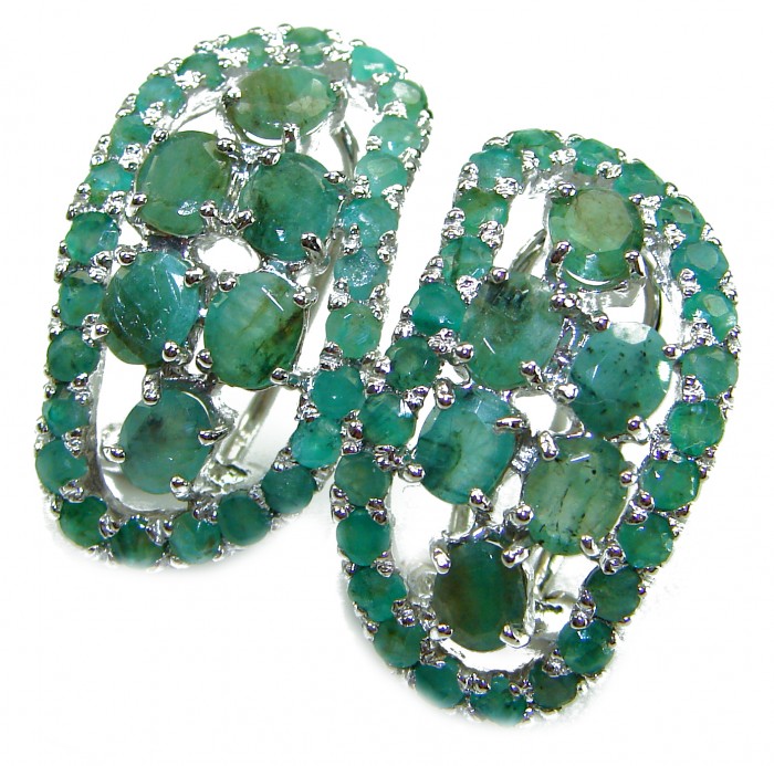 Born to Glam authentic 18.7 carat Colombian Emerald .925 Sterling Silver handcrafted Statement earrings - Close-up of oval hoop earrings with Colombian emeralds in silver setting.