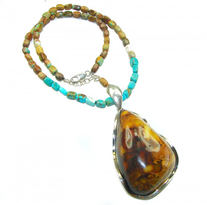 Rare!- vintage Style- natural Baltic Amber genuine Turquoise .925 Sterling Silver handcrafted necklace - Necklace with amber pendant and turquoise beads, overhead view.