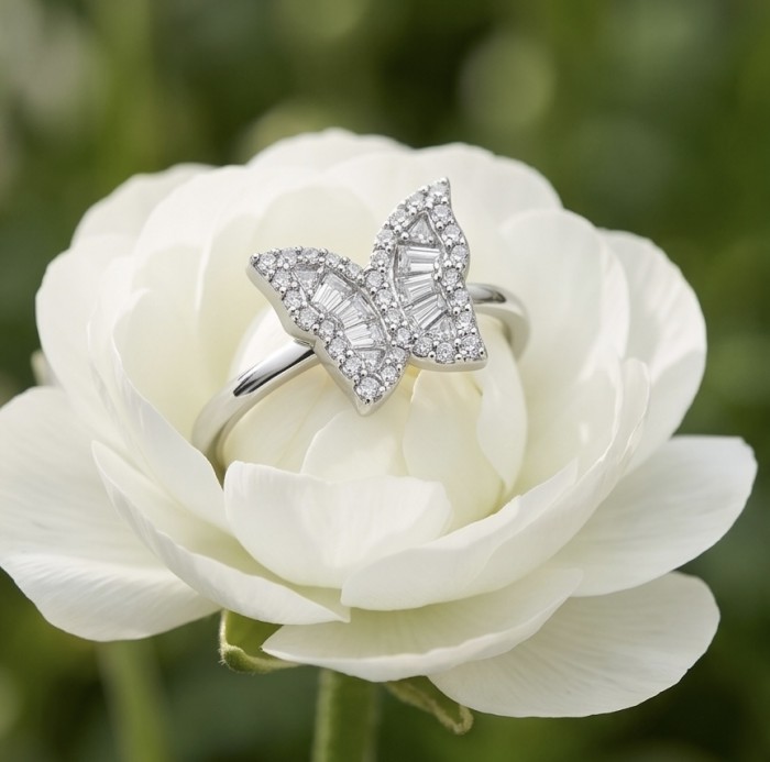 White Butterfly natural 2.5 carat Topaz .925 Sterling Silver handmade Ring size 8 1/4 - Butterfly topaz ring on white flower, front view.